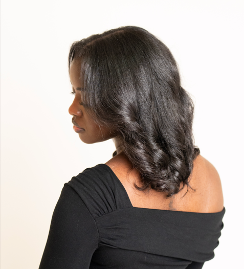 Silk press with soft curls styled by Tailored Hair